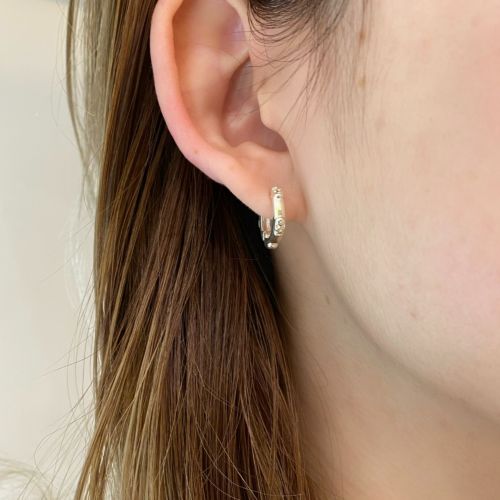 TINY SKULL HINGED HOOPS Silver pierced earrings（ピアス） Loree